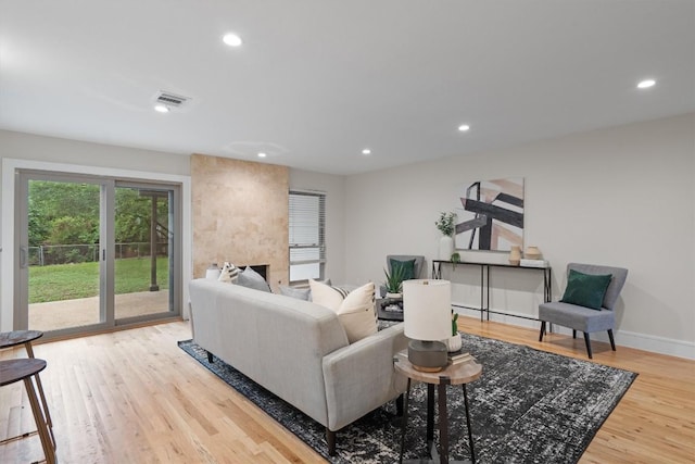6405 Danwood Dr, Austin, TX 78759 - living room featuring wood finished floors and recessed lighting
