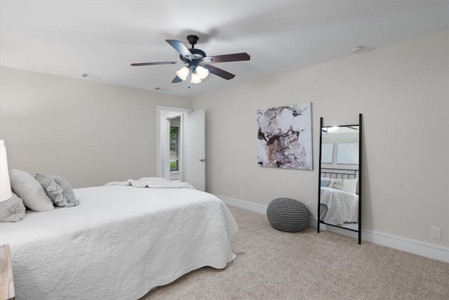 6405 Danwood Dr, Austin, TX 78759 - carpeted bedroom featuring a ceiling fan and baseboards