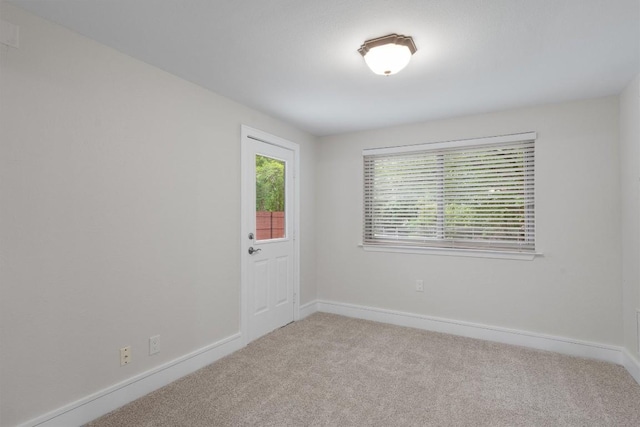 6405 Danwood Dr, Austin, TX 78759 - empty room with carpet floors and baseboards