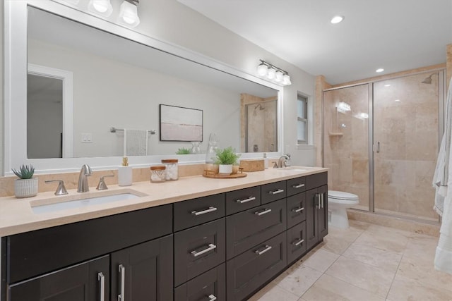 6405 Danwood Dr, Austin, TX 78759 - bathroom with double vanity, a stall shower, tile patterned flooring, and recessed lighting