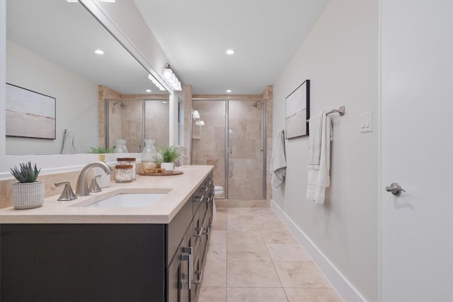 6405 Danwood Dr, Austin, TX 78759 - bathroom featuring vanity, a stall shower, and recessed lighting