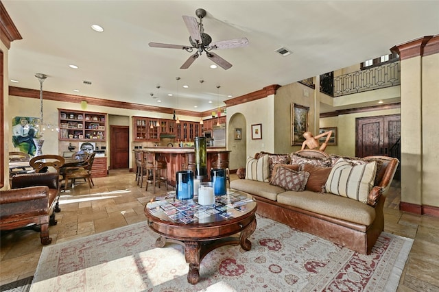 3111 Ski Shores Ter, Austin, TX 78730 - living area featuring stone tile flooring, a ceiling fan, recessed lighting, and crown molding