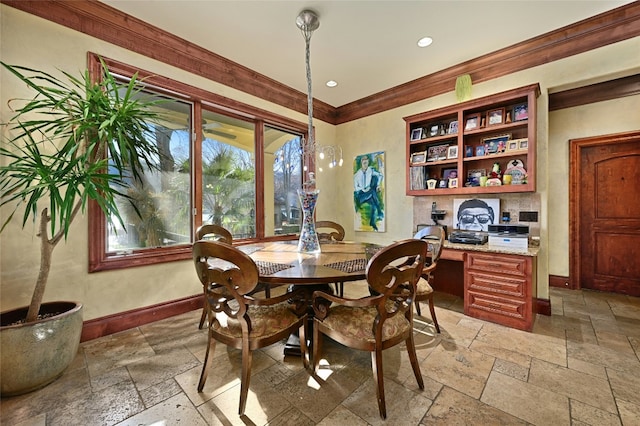 3111 Ski Shores Ter, Austin, TX 78730 - dining space featuring stone tile floors, recessed lighting, ornamental molding, and built in desk