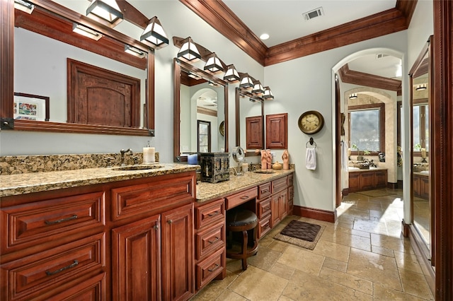 3111 Ski Shores Ter, Austin, TX 78730 - full bathroom featuring stone tile flooring, ornamental molding, vanity, and recessed lighting