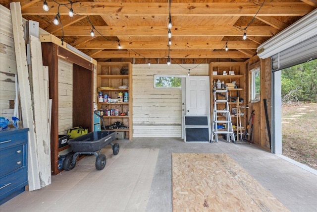 garage with wooden walls and wood ceiling