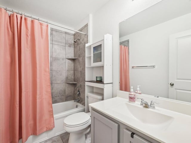 bathroom featuring shower / tub combo with curtain, toilet, and vanity
