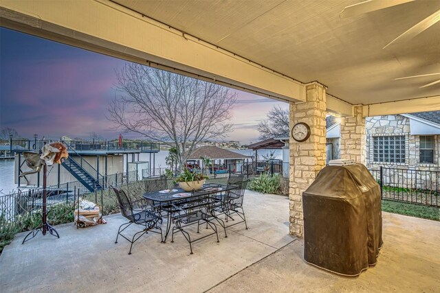609 E Briarway Dr, Granite Shoals, TX 78654 - patio terrace at dusk with a patio, outdoor dining space, and grilling area