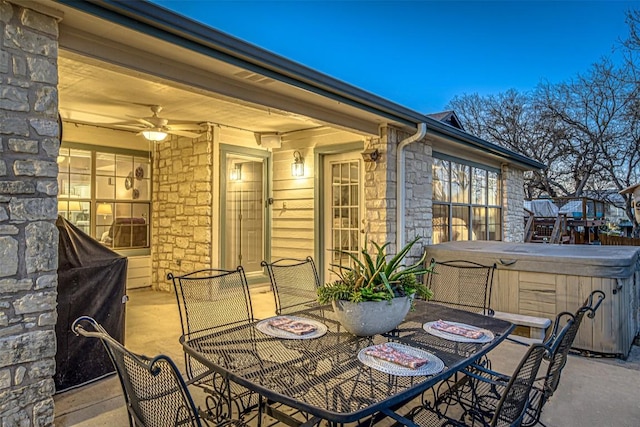 609 E Briarway Dr, Granite Shoals, TX 78654 - view of patio / terrace with outdoor dining space and a hot tub