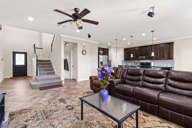 living area with visible vents, ceiling fan, recessed lighting, and baseboards