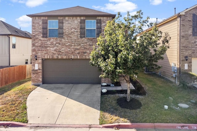 traditional-style home with brick siding, fence, a garage, driveway, and a front yard