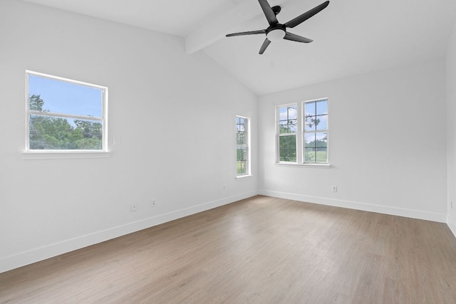 empty room featuring vaulted ceiling with beams, baseboards, ceiling fan, and wood finished floors