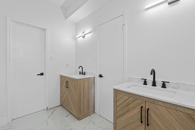 300 Fawn Ln, Georgetown, TX 78628 - bathroom featuring vanity and marble look tile flooring