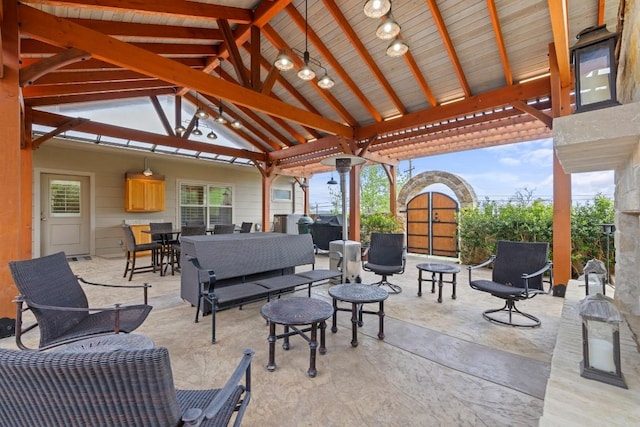 view of patio featuring a gazebo and outdoor dining space