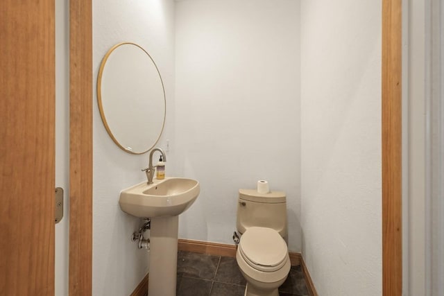 507 Arbors Cir, Elgin, TX 78621 - half bath featuring toilet and tile patterned flooring