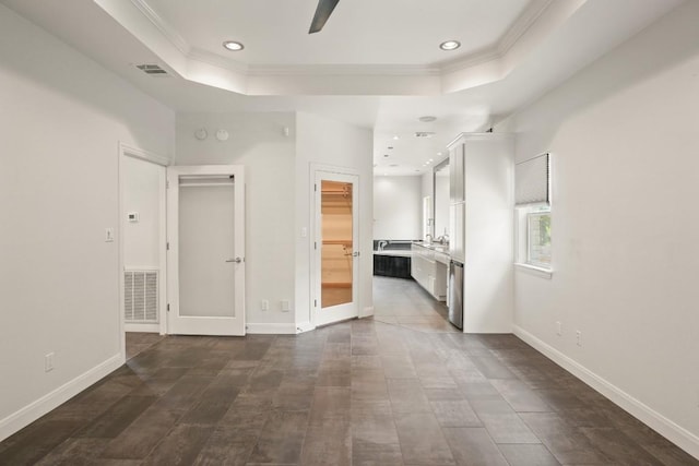 507 Arbors Cir, Elgin, TX 78621 - unfurnished room featuring a raised ceiling, crown molding, recessed lighting, and ceiling fan