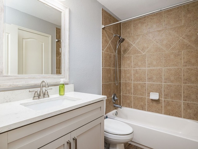 4525 Three Arrows Ct, Cedar Park, TX 78613 - bathroom with vanity, toilet, bathtub / shower combination, and a textured wall