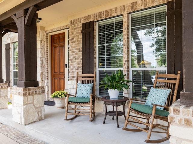 4525 Three Arrows Ct, Cedar Park, TX 78613 - entrance to property with covered porch, stone siding, and brick siding
