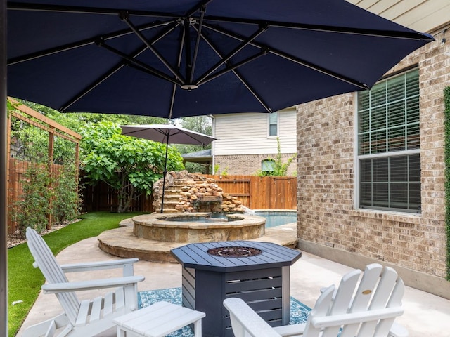 4525 Three Arrows Ct, Cedar Park, TX 78613 - fenced backyard featuring a patio area and an outdoor fire pit
