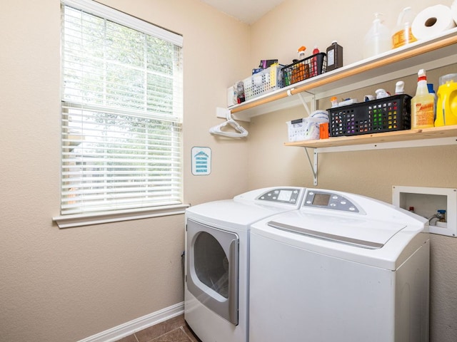 4525 Three Arrows Ct, Cedar Park, TX 78613 - washroom with washer and dryer, baseboards, and dark tile patterned flooring
