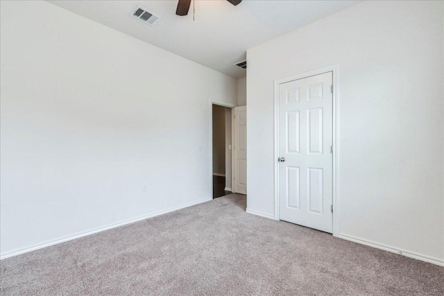 13305 Henneman Dr, Pflugerville, TX 78660 - unfurnished bedroom featuring visible vents, baseboards, a ceiling fan, and light carpet