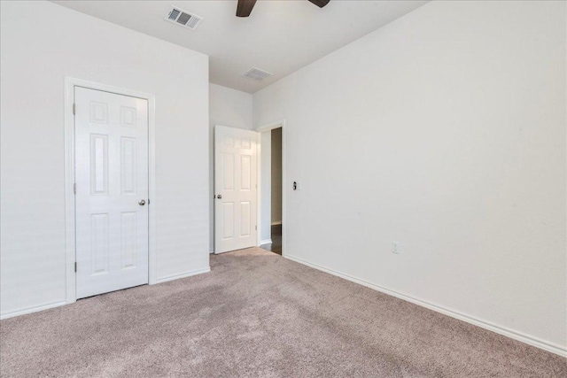 13305 Henneman Dr, Pflugerville, TX 78660 - unfurnished bedroom featuring visible vents, carpet flooring, and baseboards