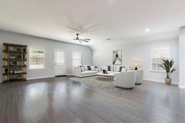 13305 Henneman Dr, Pflugerville, TX 78660 - living area featuring dark wood-style floors, baseboards, visible vents, and ceiling fan