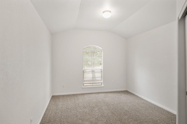 155 San Miniato St, Georgetown, TX 78628 - carpeted empty room with vaulted ceiling and baseboards