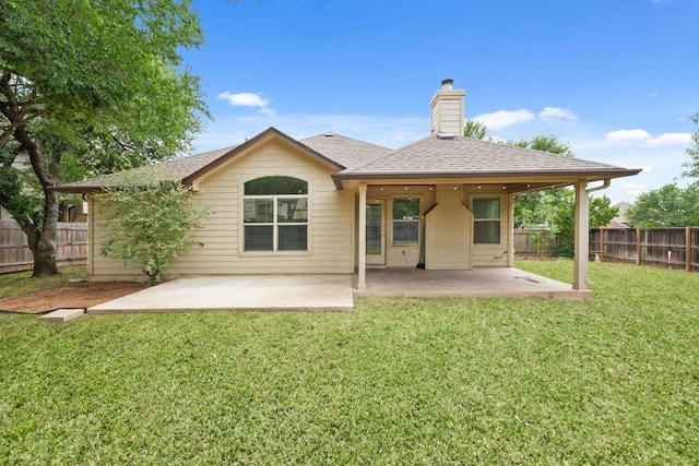 155 San Miniato St, Georgetown, TX 78628 - back of house with a chimney, a patio area, and roof with shingles
