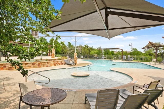 155 San Miniato St, Georgetown, TX 78628 - community pool featuring a patio