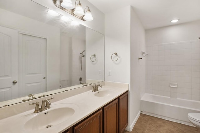 155 San Miniato St, Georgetown, TX 78628 - full bath with toilet, tile patterned floors, double vanity, and shower / bathtub combination