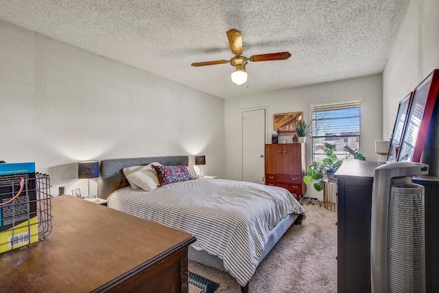 1515 W Braker Ln Unit A, Austin, TX 78758 - carpeted bedroom featuring a textured ceiling and ceiling fan