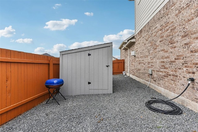 361 Wild Pecan Loop, Buda, TX 78610 - fenced backyard featuring a storage shed