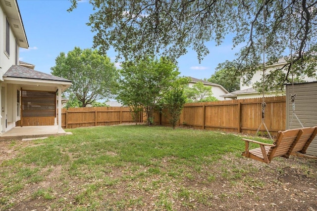 view of yard featuring a fenced backyard