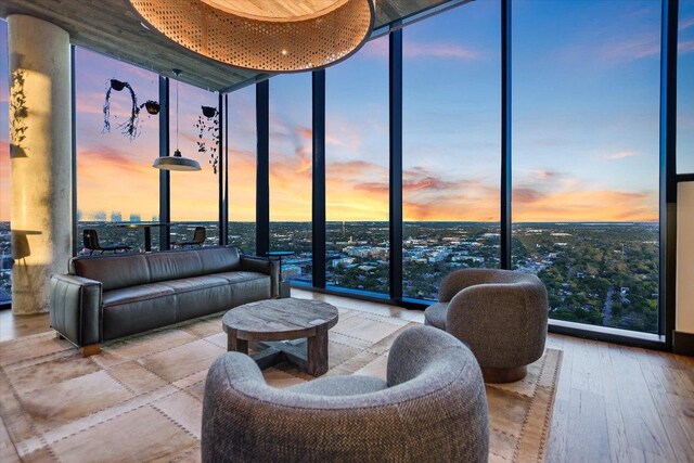 84 E Ave Unit 3909, Austin, TX 78701 - living room featuring hardwood / wood-style floors and floor to ceiling windows