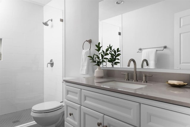 5707 Ave G, Austin, TX 78752 - bathroom featuring tiled shower and vanity