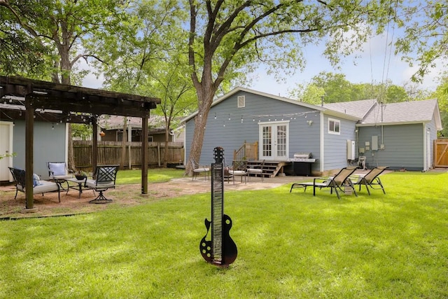 5707 Ave G, Austin, TX 78752 - view of yard with french doors, a pergola, and a patio
