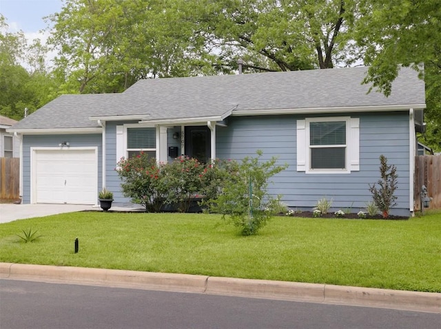 single story home with fence, a front lawn, and a garage