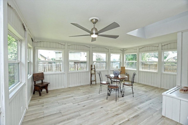 2208 Mimosa Trl, Round Rock, TX 78664 - sunroom featuring wood finished floors, a wooden deck, and a decorative wall