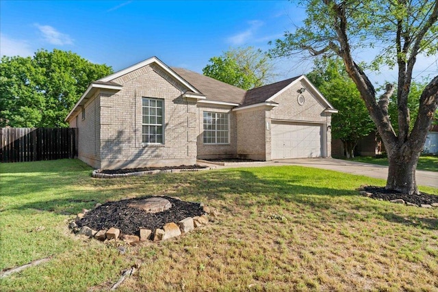 single story home featuring brick siding, fence, a front yard, concrete driveway, and an attached garage