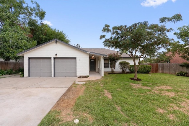 single story home featuring a garage, fence, a front lawn, and concrete driveway