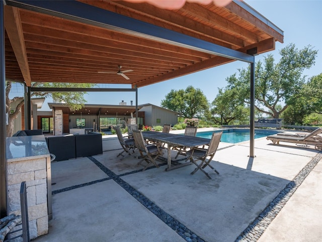 view of patio with an outdoor living space, a ceiling fan, outdoor dining space, and an outdoor pool