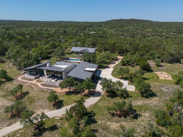 aerial view featuring a forest view