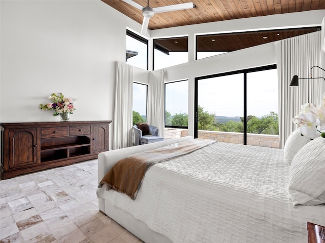 bedroom featuring beam ceiling, wooden ceiling, access to exterior, and high vaulted ceiling