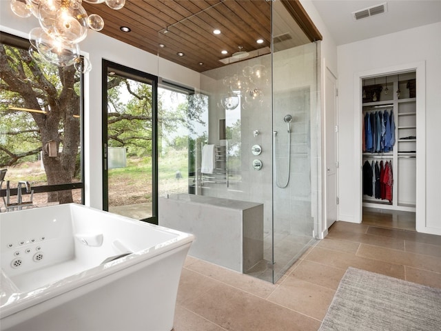 full bathroom featuring a tub with jets, visible vents, tiled shower, and wood ceiling