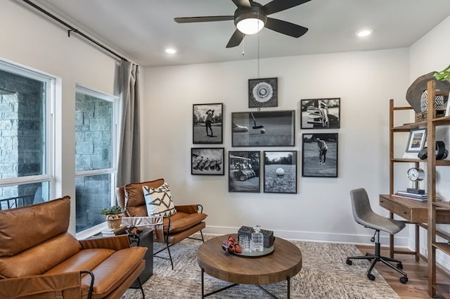office featuring recessed lighting, ceiling fan, wood finished floors, and baseboards