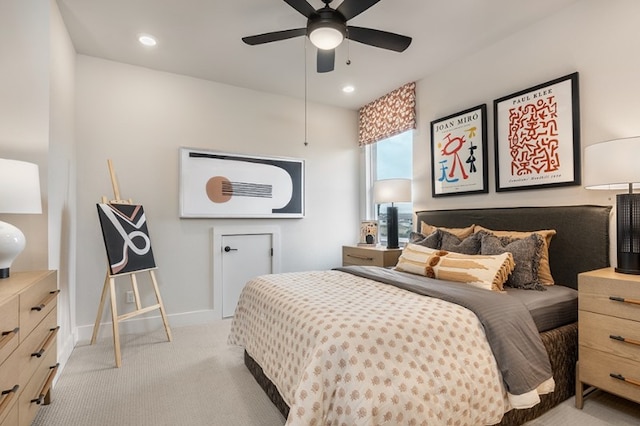 bedroom featuring baseboards, recessed lighting, light carpet, and ceiling fan