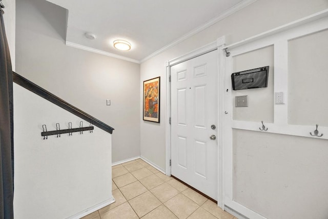 11811 Buggy Whip Trl, Austin, TX 78750 - entryway featuring ornamental molding, light tile patterned flooring, and baseboards