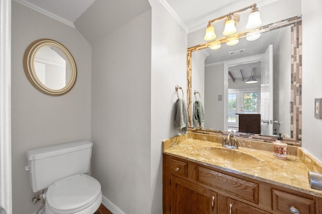 11811 Buggy Whip Trl, Austin, TX 78750 - half bathroom featuring ornamental molding, toilet, and vanity