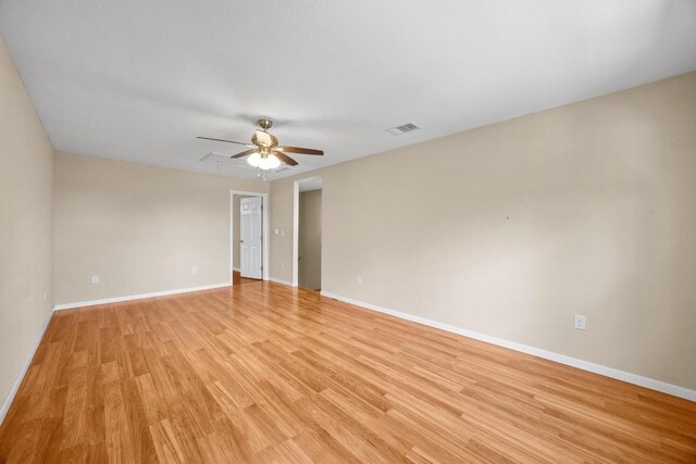 11811 Buggy Whip Trl, Austin, TX 78750 - unfurnished room featuring light wood-style floors, ceiling fan, and baseboards