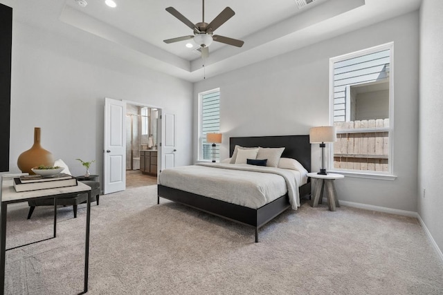320 Creek Rd Unit 202, Dripping Springs, TX 78620 - bedroom featuring a raised ceiling, multiple windows, carpet, baseboards, and recessed lighting